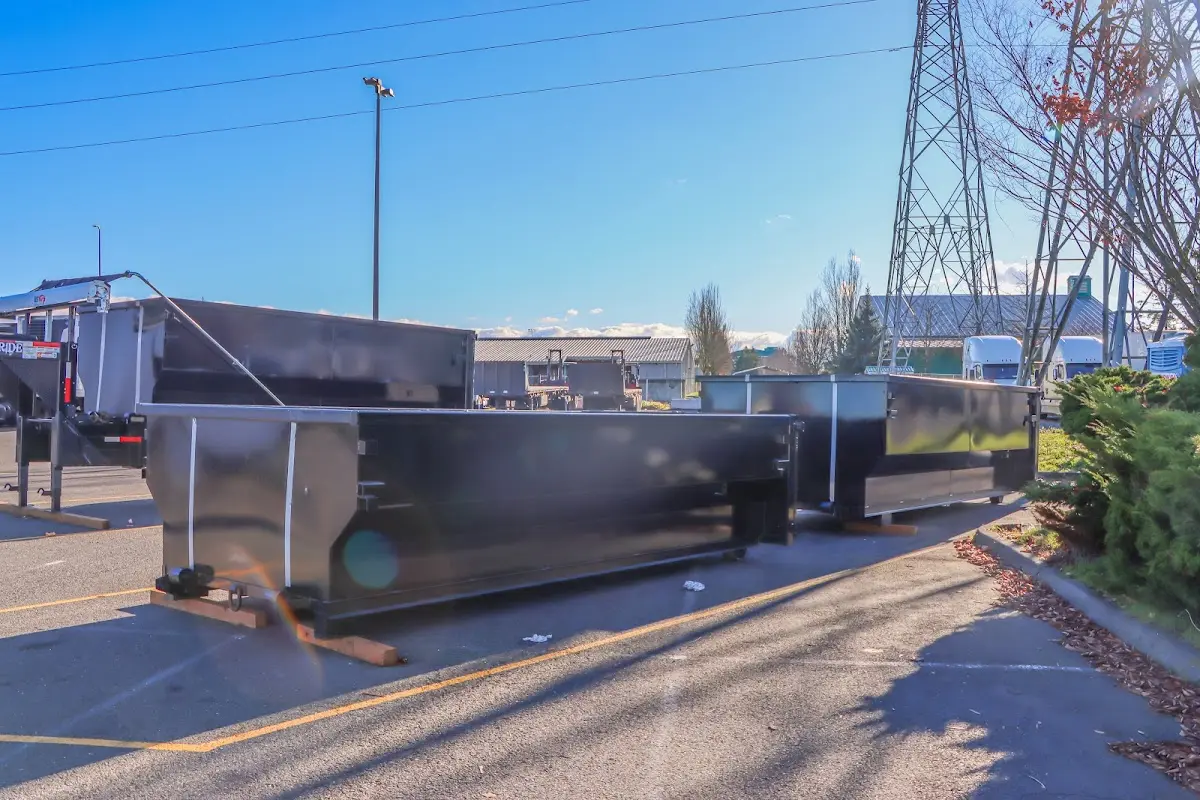 Roll-off dumpster ready for waste disposal at job site for Roofing Dumpster Rental in Egg Harbor